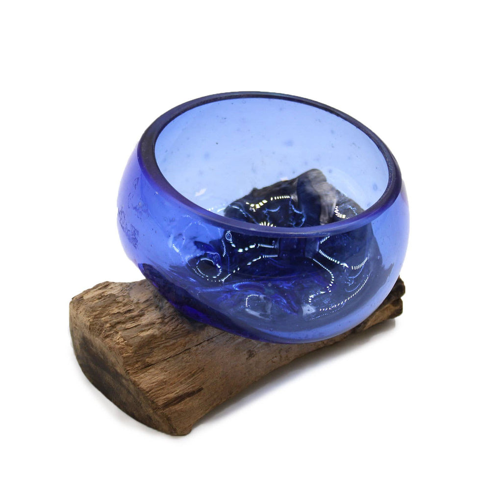 Miniature blue recycled glass bowl set on natural wood base