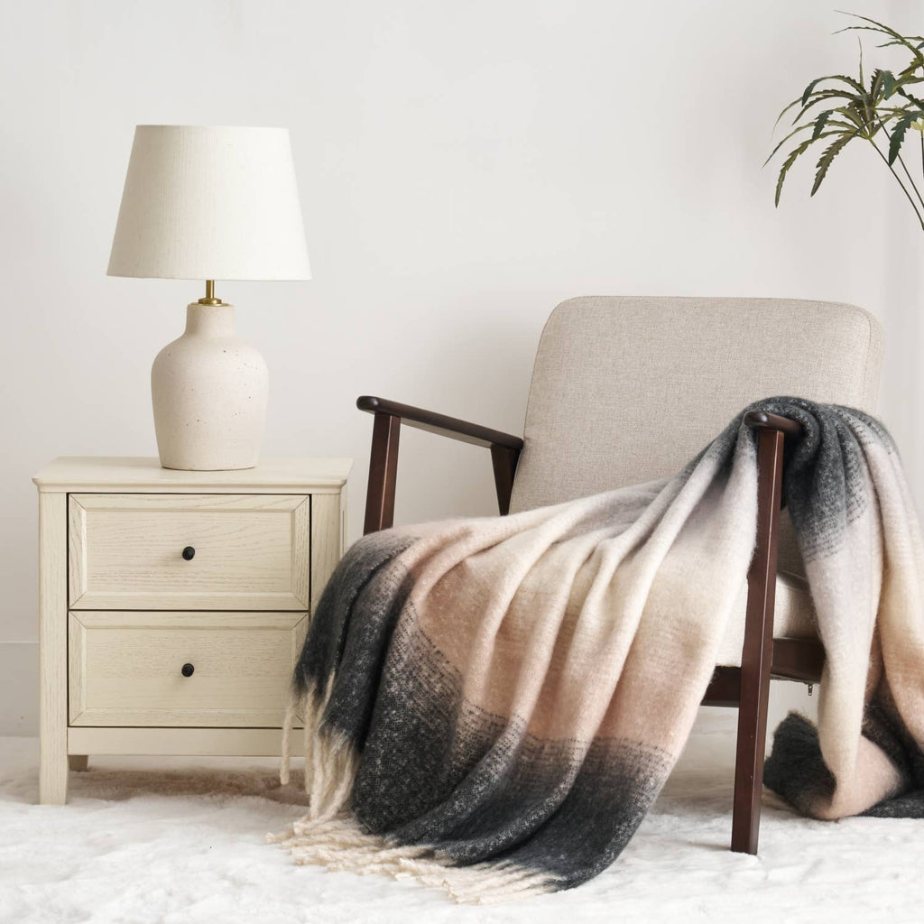 Highland Mist Ombre Throw shown fading from pale grey to deep charcoal, Croft & Cleo