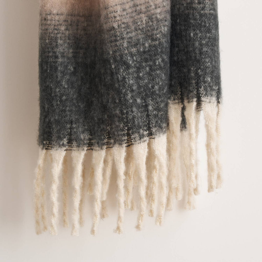 Highland Mist Ombre Throw in Charcoal draped over a chair, Croft & Cleo
