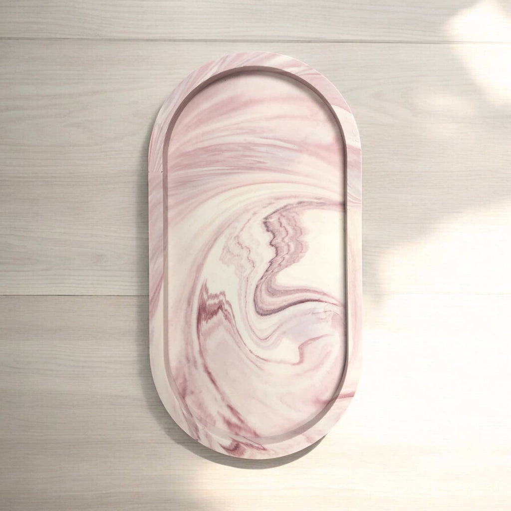 Close-up of deep merlot marble effect on handcrafted Jesmonite oval tray, Croft & Cleo
