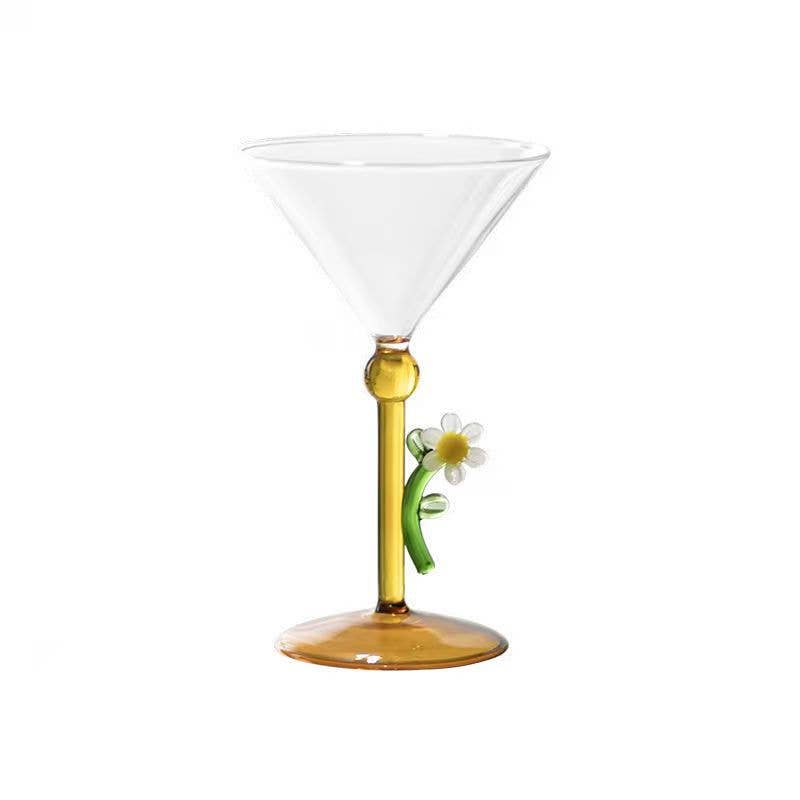 Clear cocktail glass featuring a sculptural daisy stem, catching the light, Croft & Cleo