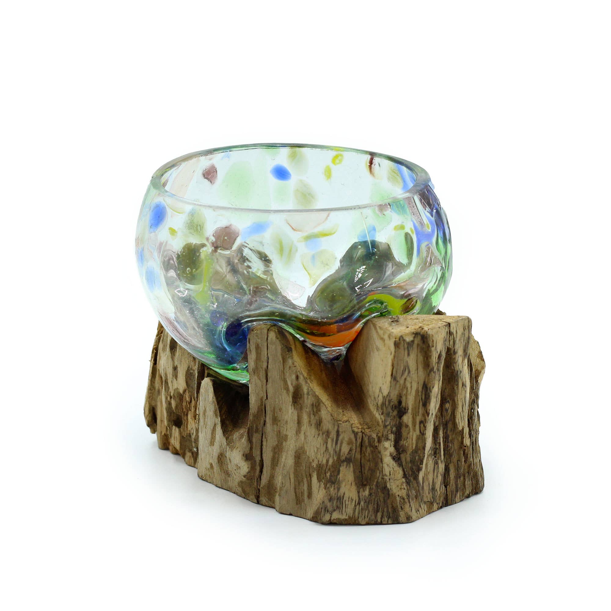 Hand-blown coloured glass small decorative bowl on wood, colours shifting with light