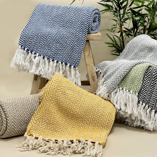 Moorland Herringbone Cotton Throw in Moss, draped and styled at home, Croft & Cleo