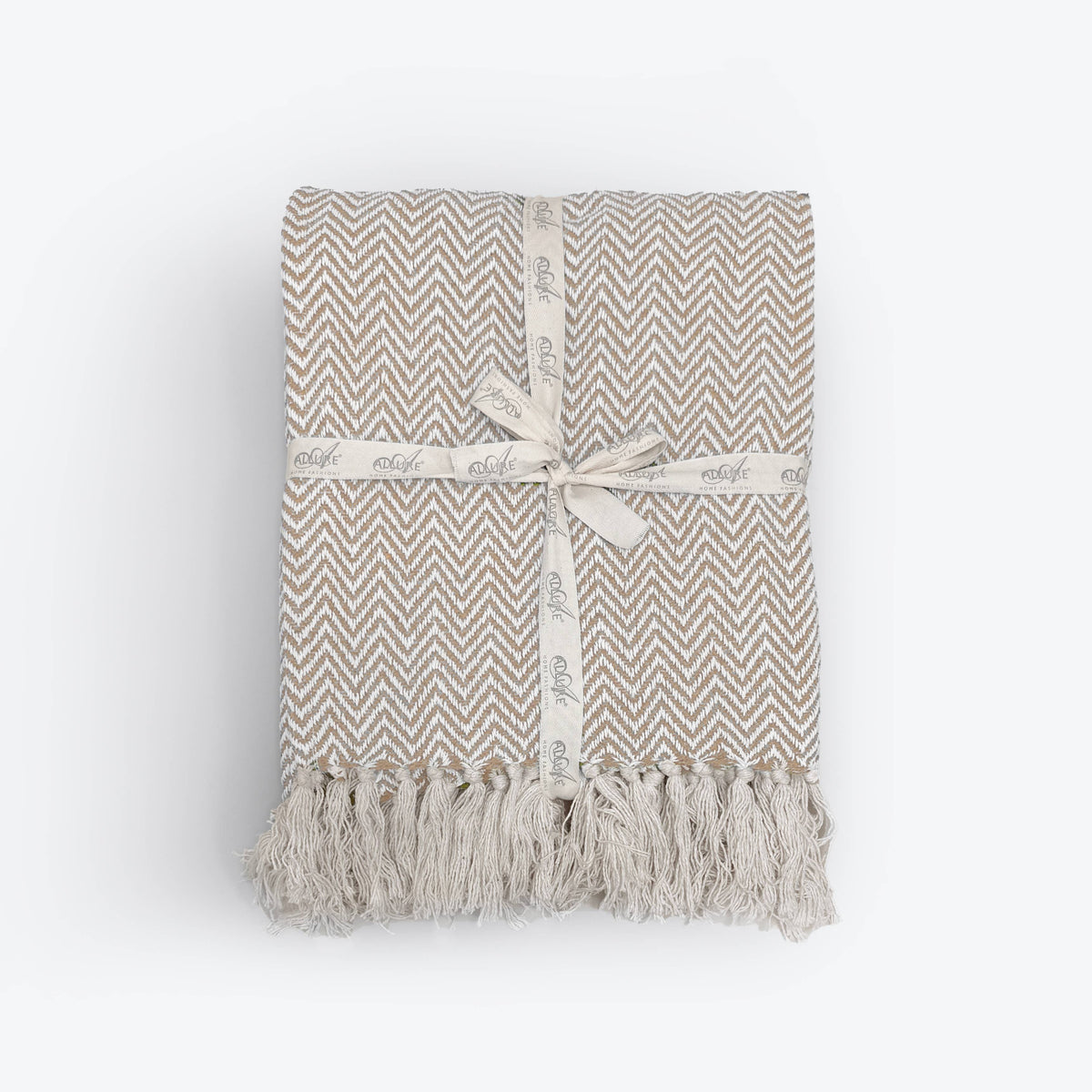 Moorland Herringbone Cotton Throw shown in deep moss green, Croft & Cleo