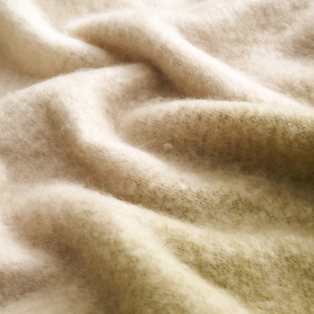 Tasselled fringe detail on the Highland Mist Ombre Throw in Charcoal, Croft & Cleo
