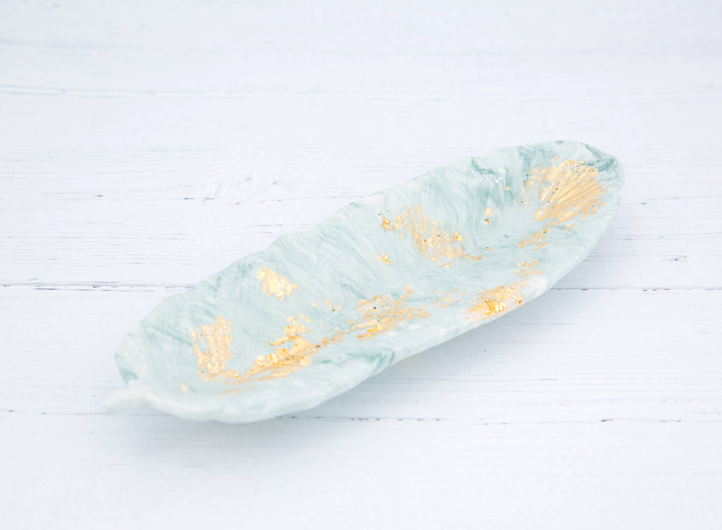 Handmade Jesmonite feather in zen green marble with gold leaf flecks — product shot, Croft & Cleo