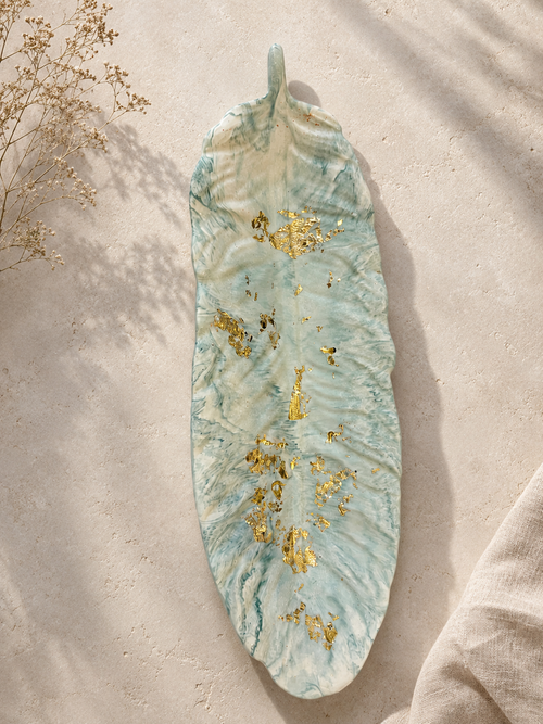 Handmade Jesmonite feather in zen green marble with gold leaf flecks — alternate angle, Croft & Cleo