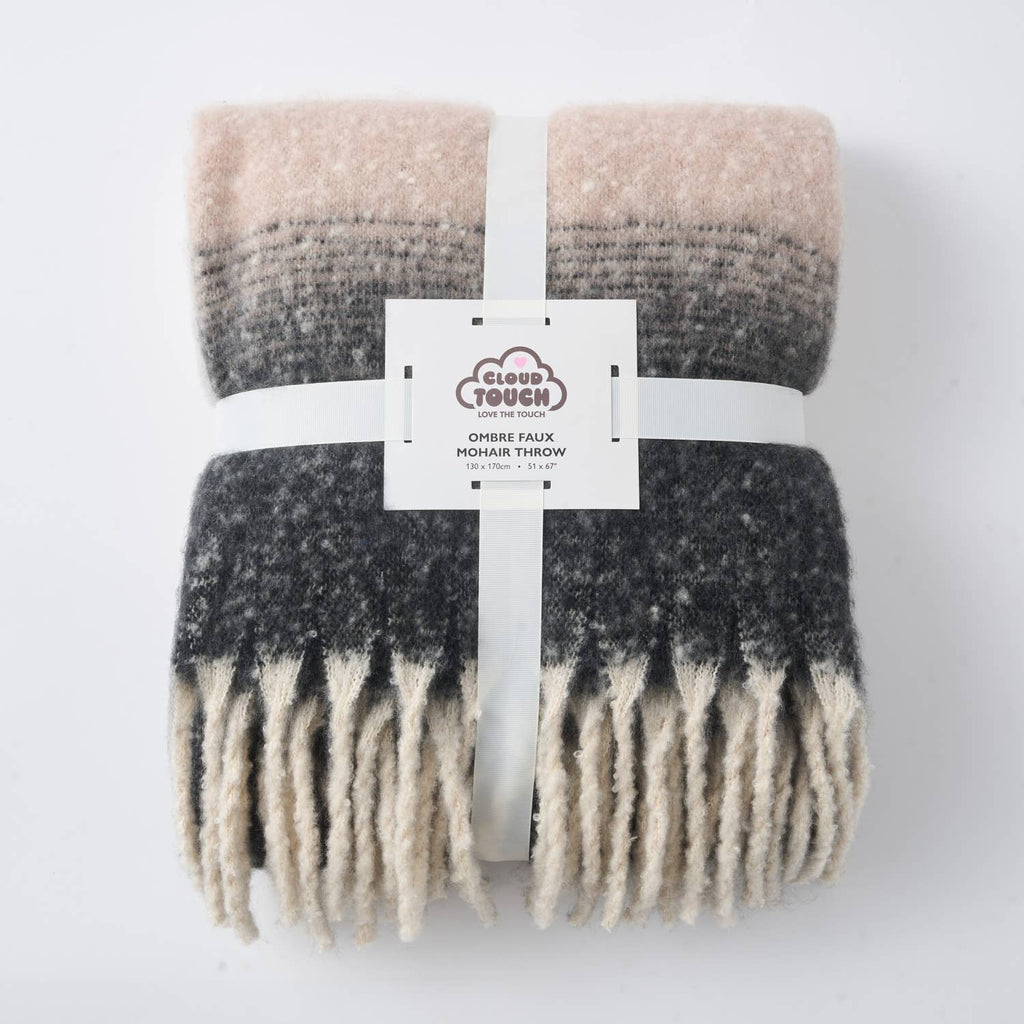 Highland Mist Ombre Throw in Charcoal, folded to show the ombre gradient and tasselled fringe, Croft & Cleo