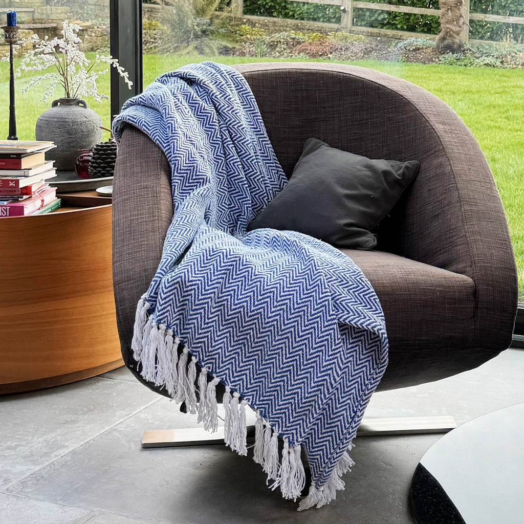 Tasselled fringe detail on the Moorland Herringbone Cotton Throw in Moss, Croft & Cleo