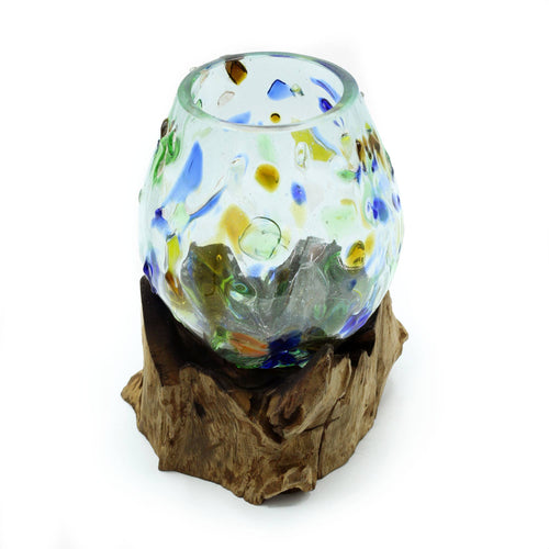 Hand-blown coloured glass medium bowl with wooden base showing luminous tones