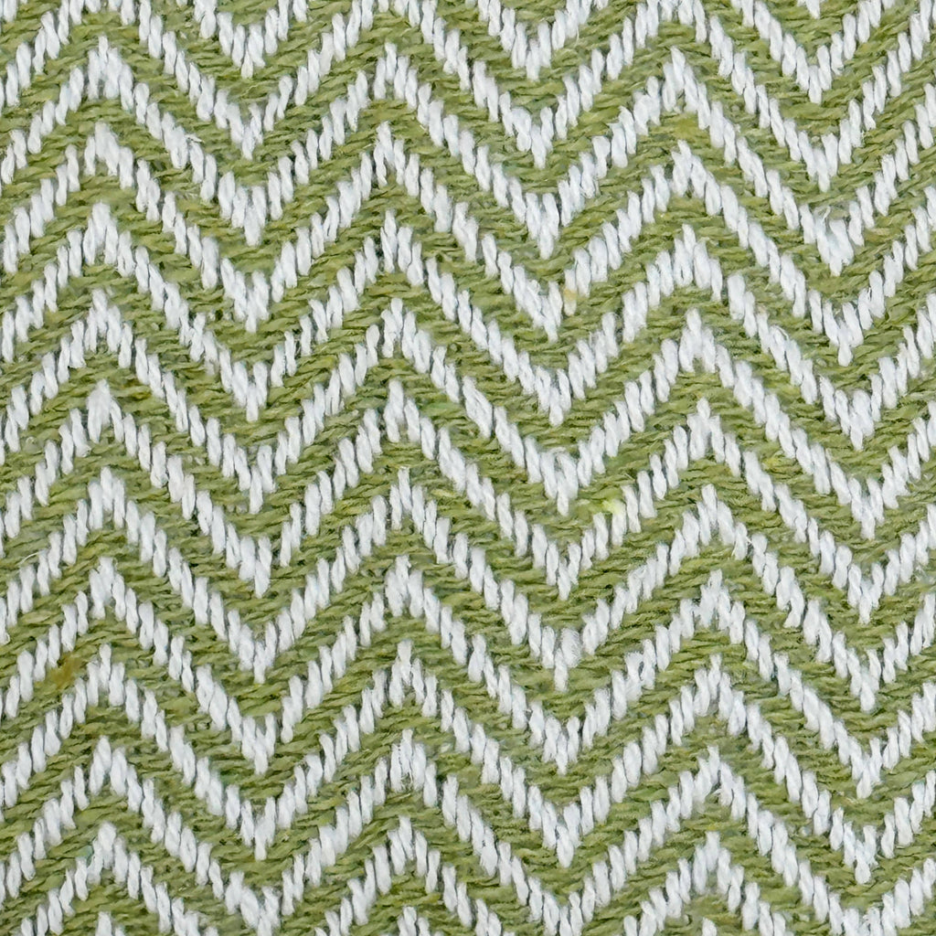 Texture detail of the herringbone weave on the Moorland Herringbone Cotton Throw in Moss, Croft & Cleo
