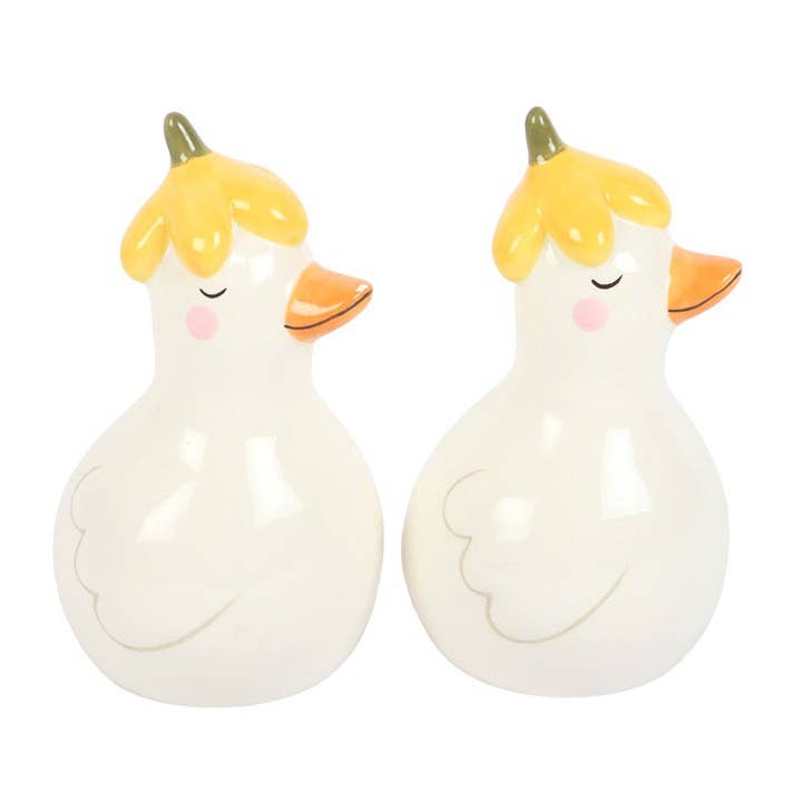 Close-up of ceramic duck shaker with floral hat detail, Croft & Cleo